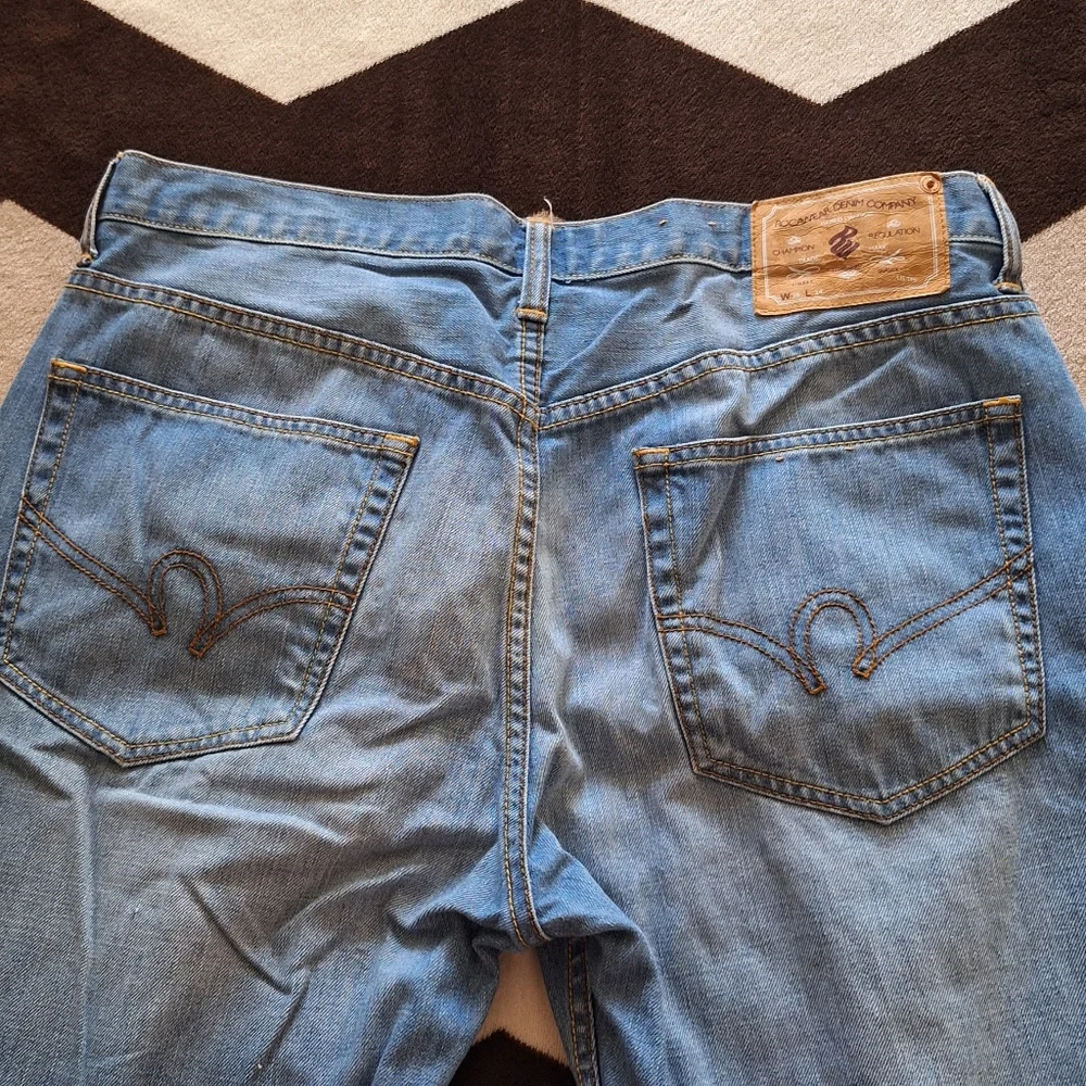 Men's Y2K jeans by RocaWear